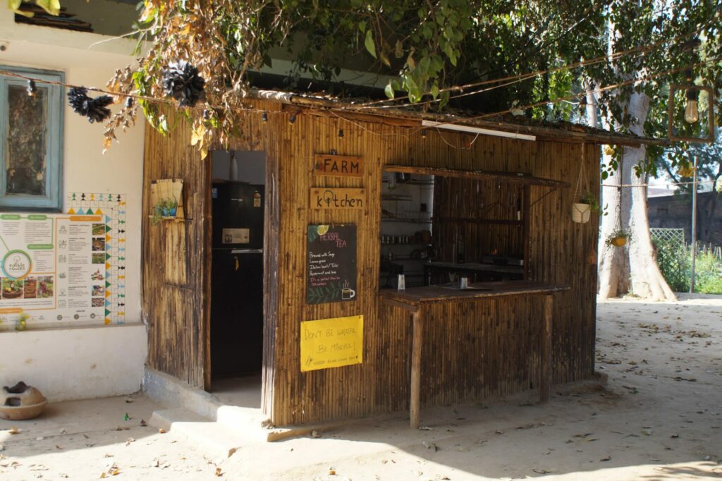 The farm kitchen on the Amarkanan farm is a small wooden building.  